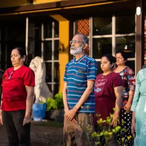 Home 5 group of elderly people doing yoga